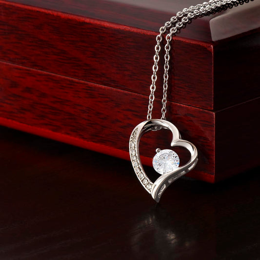 Discover the Forever Love Necklace with a stunning CZ crystal in gold finishes, perfect for gifting. Fast shipping available globally